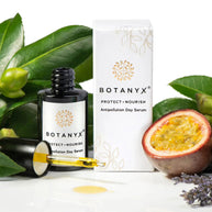 Botanyx skincare product with leaves and a fruit on a white background